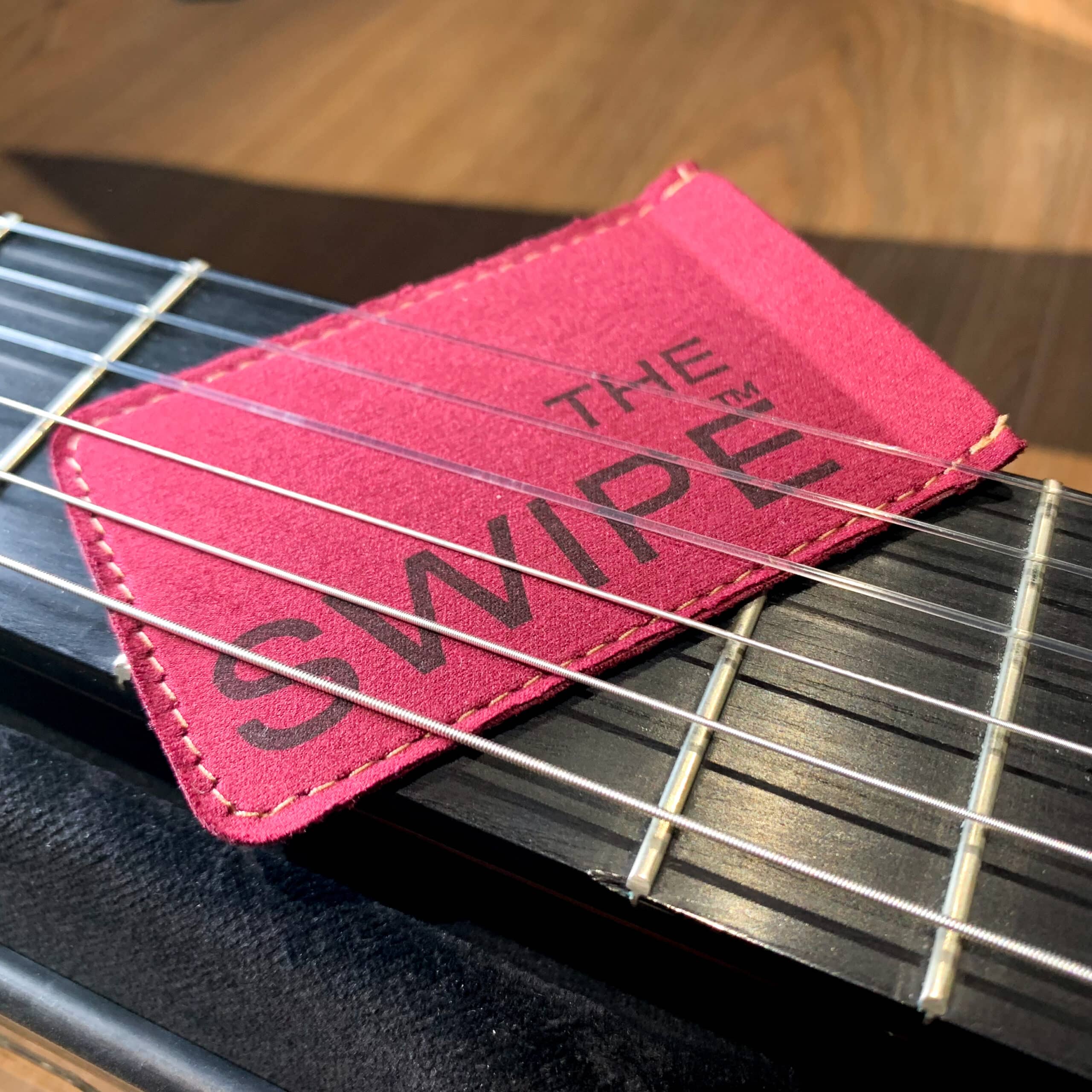 The Swipe - string cleaning cloth